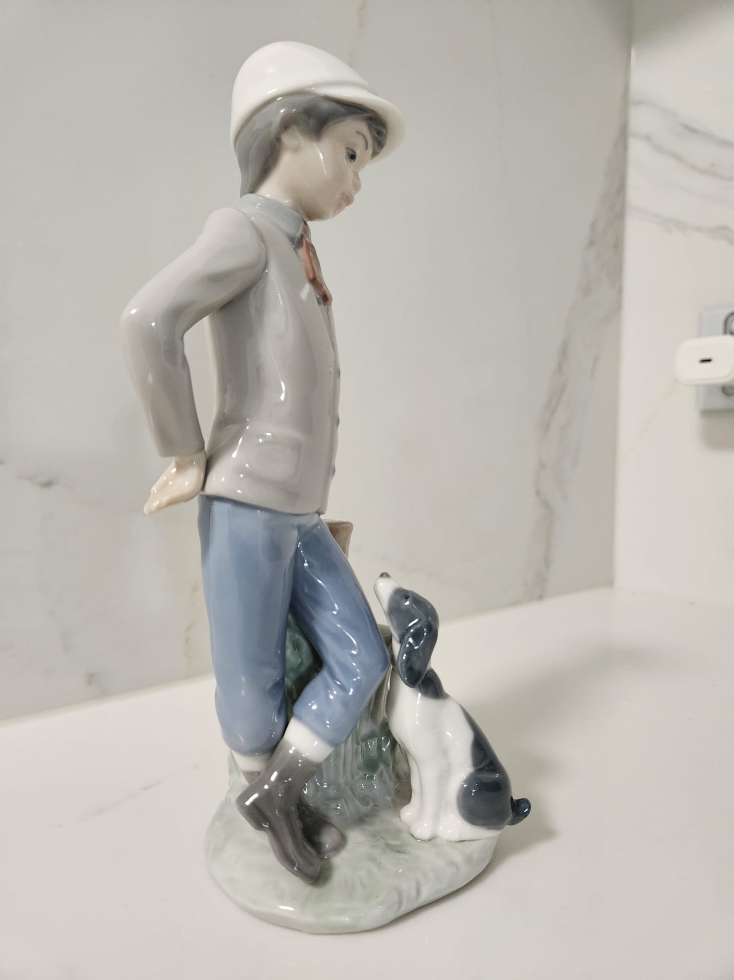 Nao by Lladro figurine Affectionate Pup Boy with dog -Model #0201038
