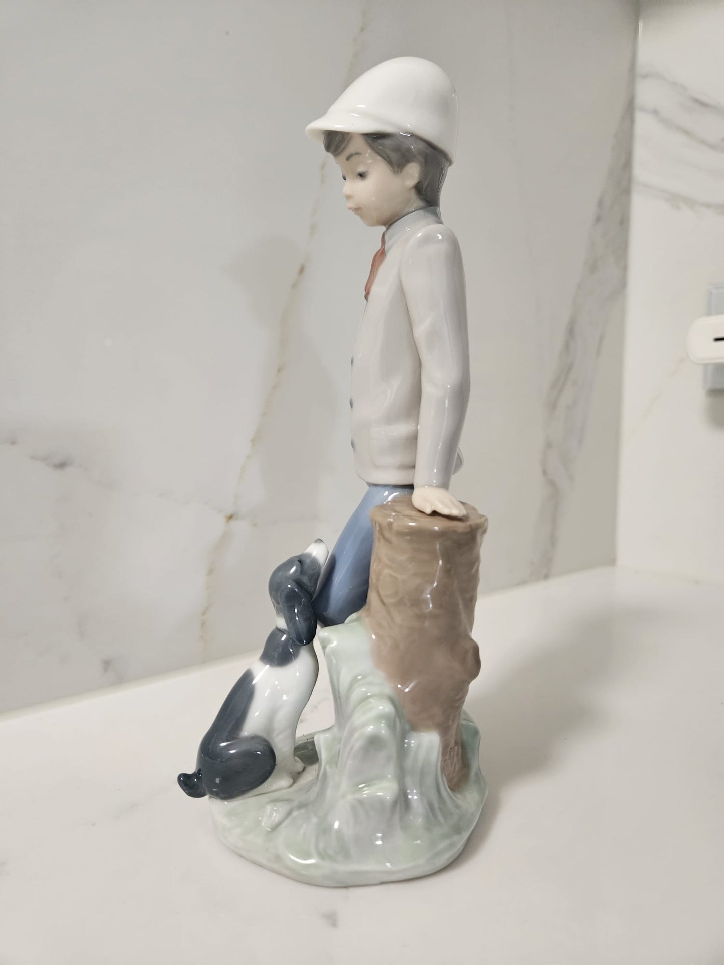 Nao by Lladro figurine Affectionate Pup Boy with dog -Model #0201038