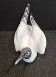 A collectible Metzler & Ortloff hand-painted porcelain seagull figurine.