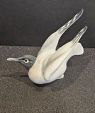 A collectible Metzler & Ortloff hand-painted porcelain seagull figurine.