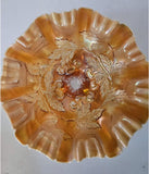 Antique Dugan 3 footed carnival glass bowl in a peach opalescent color