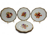 Set of 4 Victorian (1840-1900) plates with fruit design and gold trims