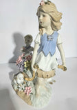 Lladro "style" Porcelaine Figure of 2 girls with Flowers in a wheelbarrow