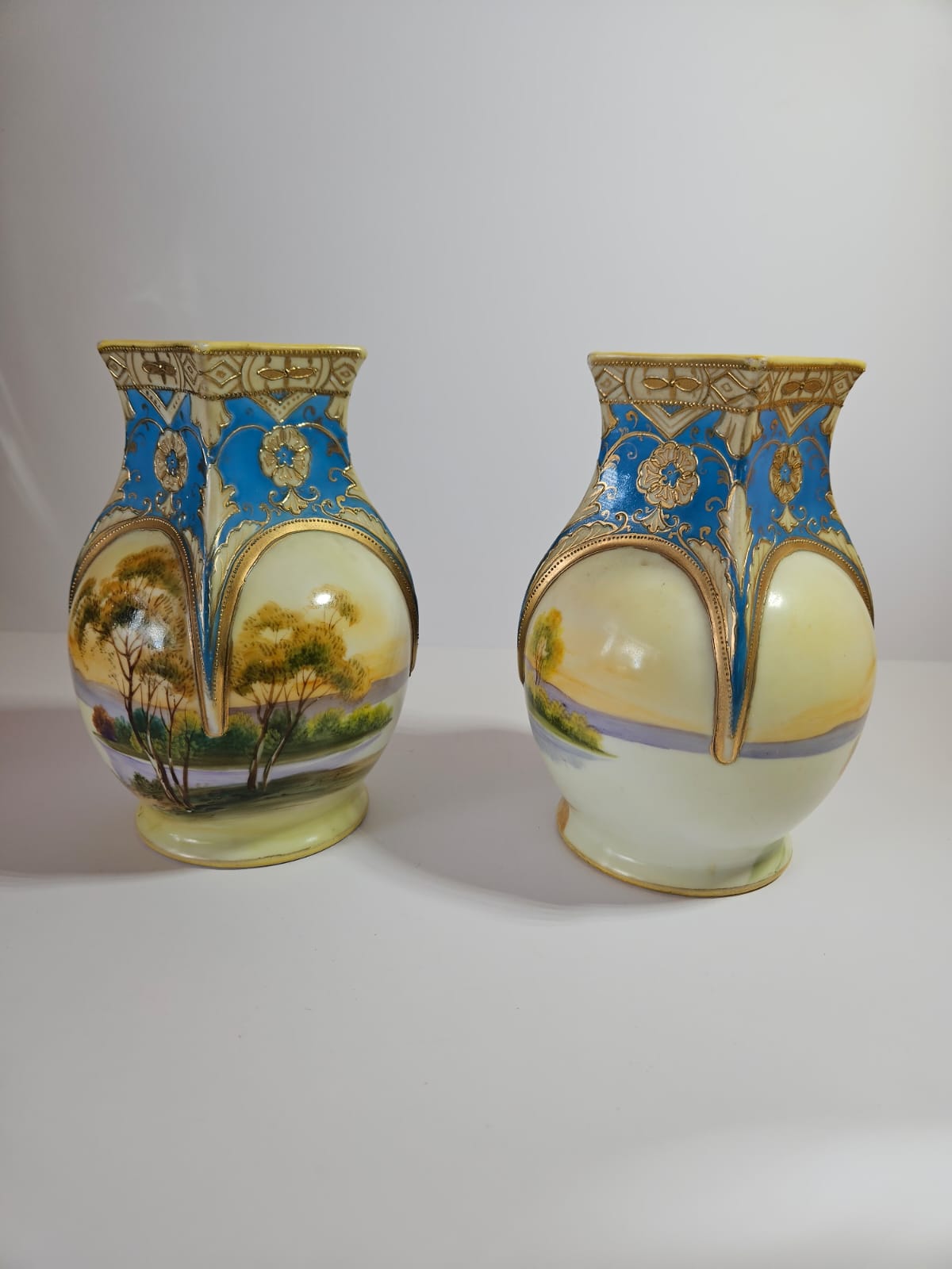 A pair of early antique NORITAKE Vases with hand painted scenes & gilding c.1890