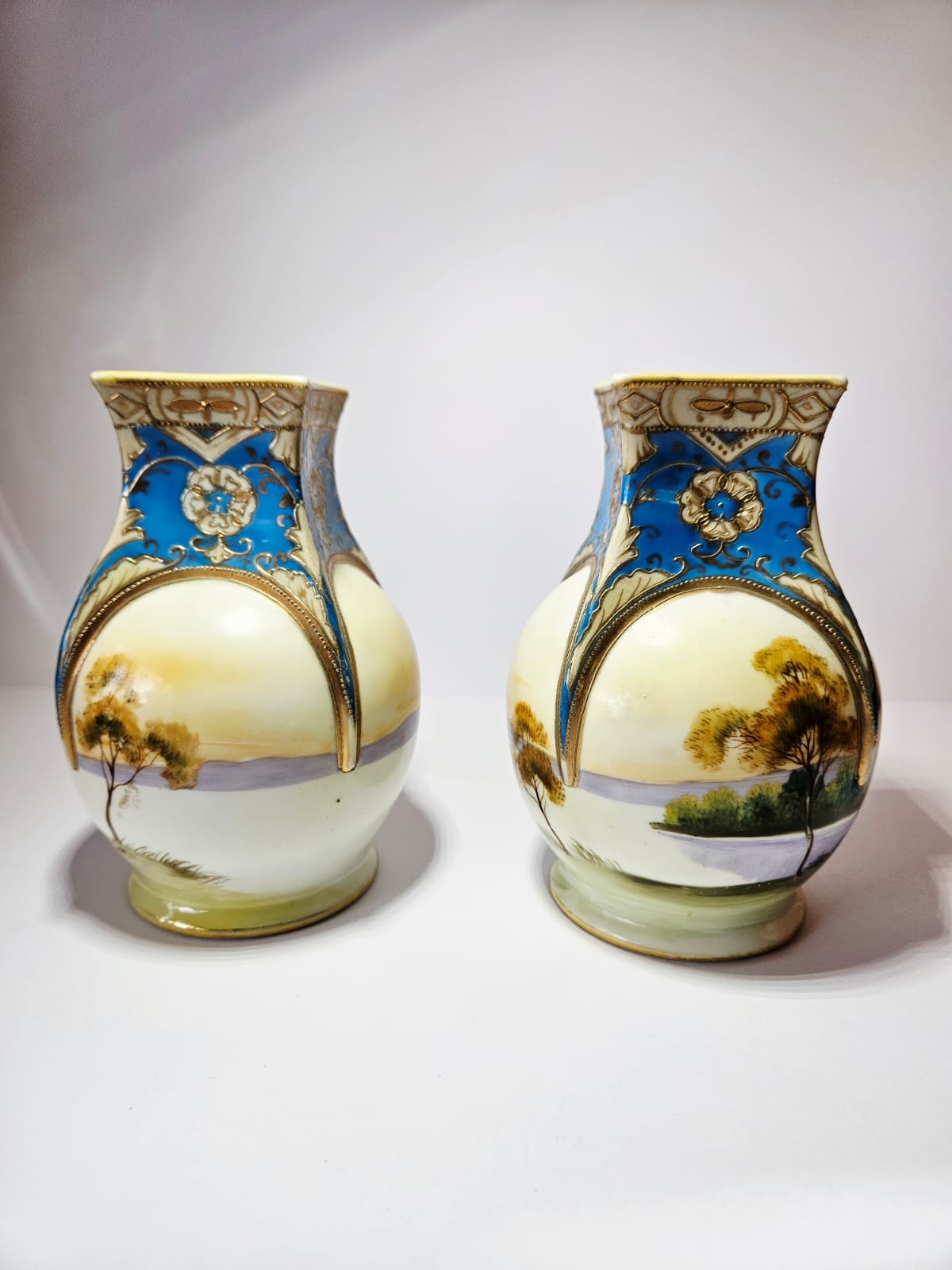 A pair of early antique NORITAKE Vases with hand painted scenes & gilding c.1890