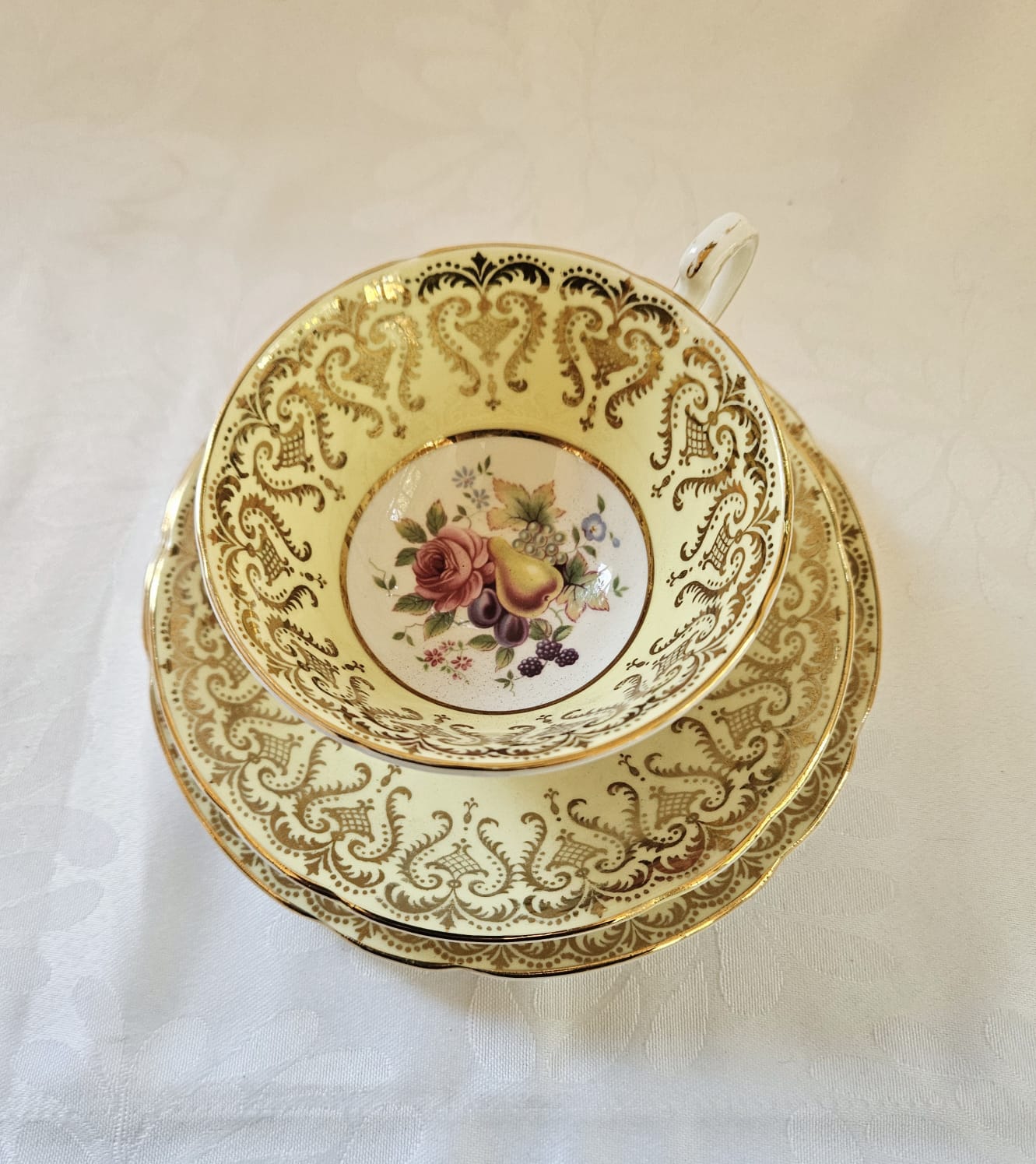 Paragon By "Appointment to Her Majesty The Queen" Pale Yellow Tea-set trio with Rose and Fruit