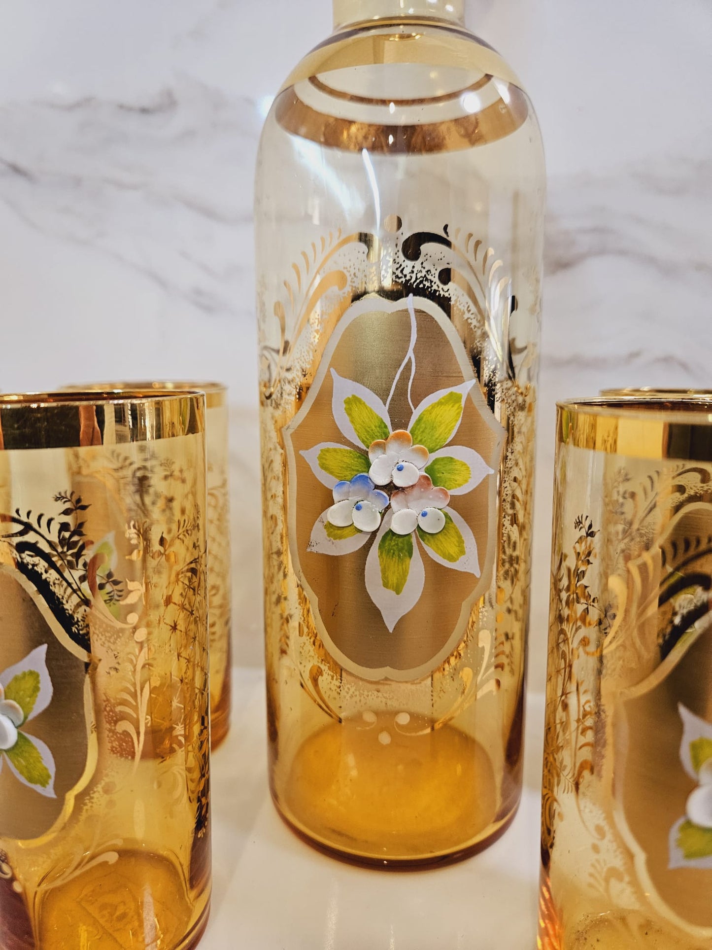 Vintage Venetian decanter and 6 enameled glasses with hand painted floral pattern and gold guilding