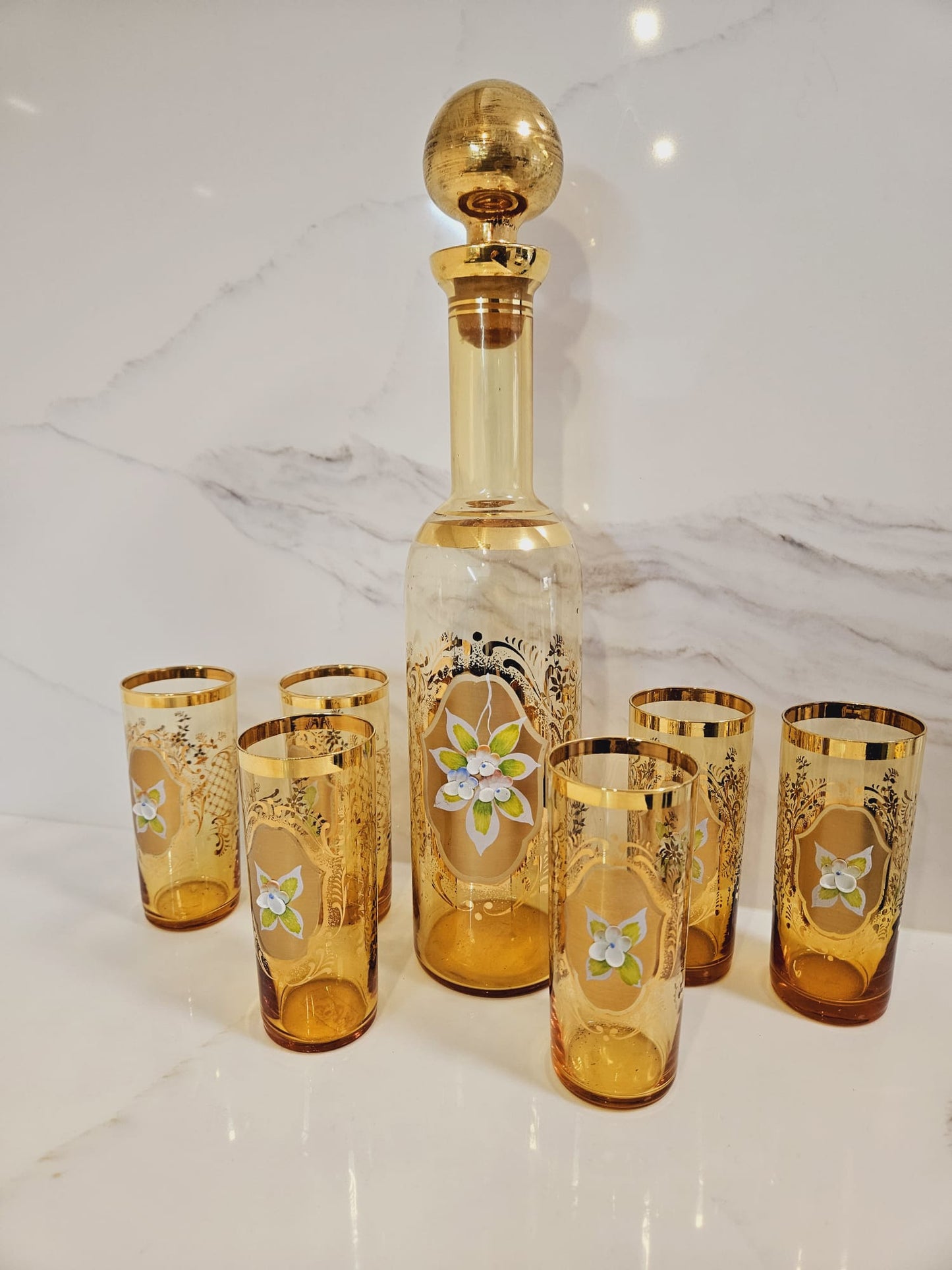 Vintage Venetian decanter and 6 enameled glasses with hand painted floral pattern and gold guilding