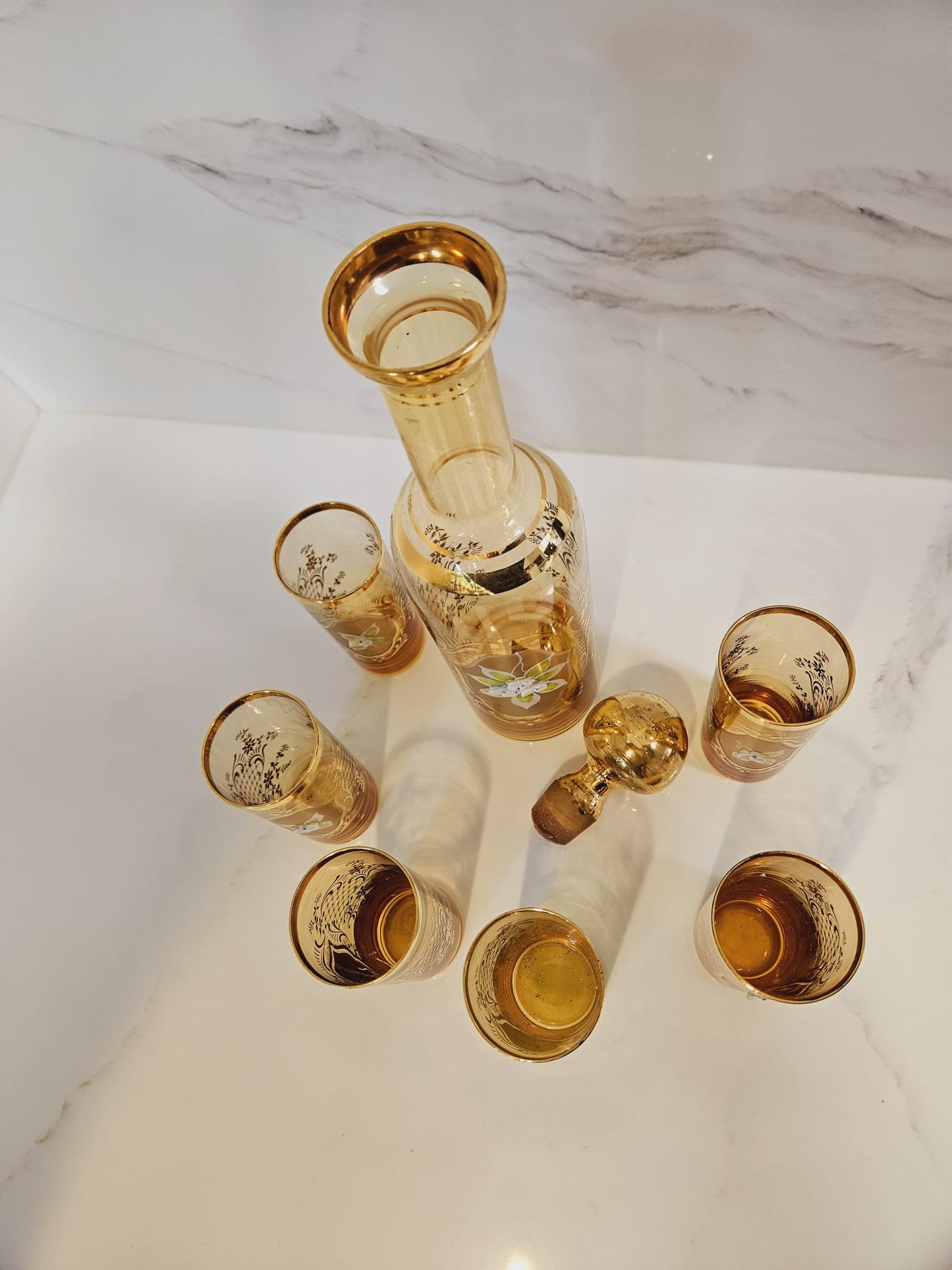 Vintage Venetian decanter and 6 enameled glasses with hand painted floral pattern and gold guilding