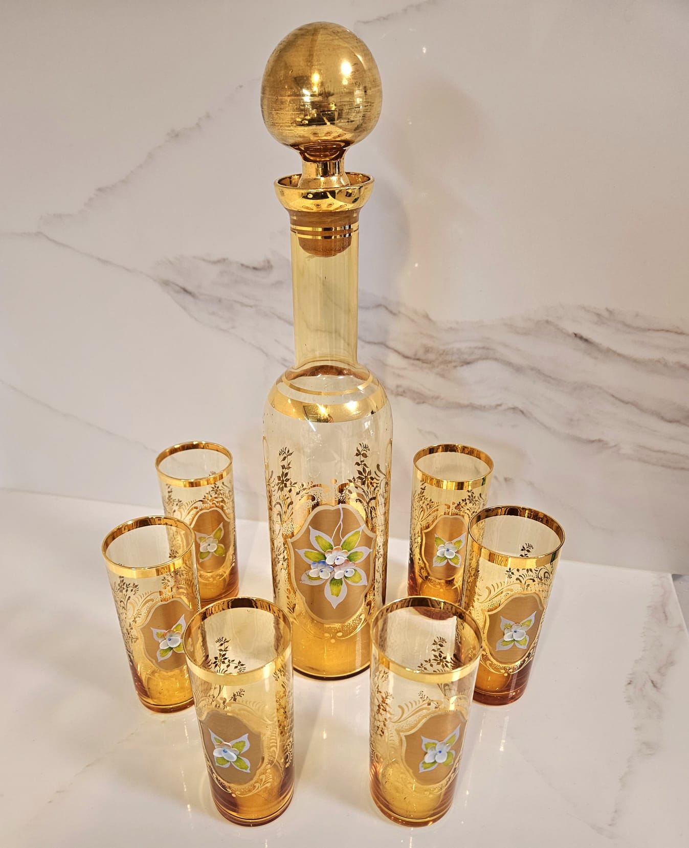Vintage Venetian decanter and 6 enameled glasses with hand painted floral pattern and gold guilding