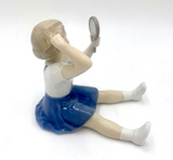 Porcelain figurine of a girl combing, Bing & Grondahl, Denmark, 1950s / 1960s