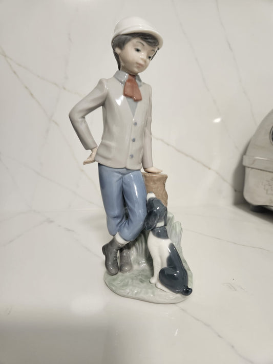 Nao by Lladro figurine Affectionate Pup Boy with dog -Model #0201038