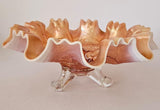 Antique Dugan 3 footed carnival glass bowl in a peach opalescent color