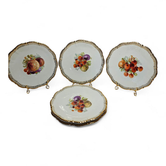 Set of 4 Victorian (1840-1900) plates with fruit design and gold trims
