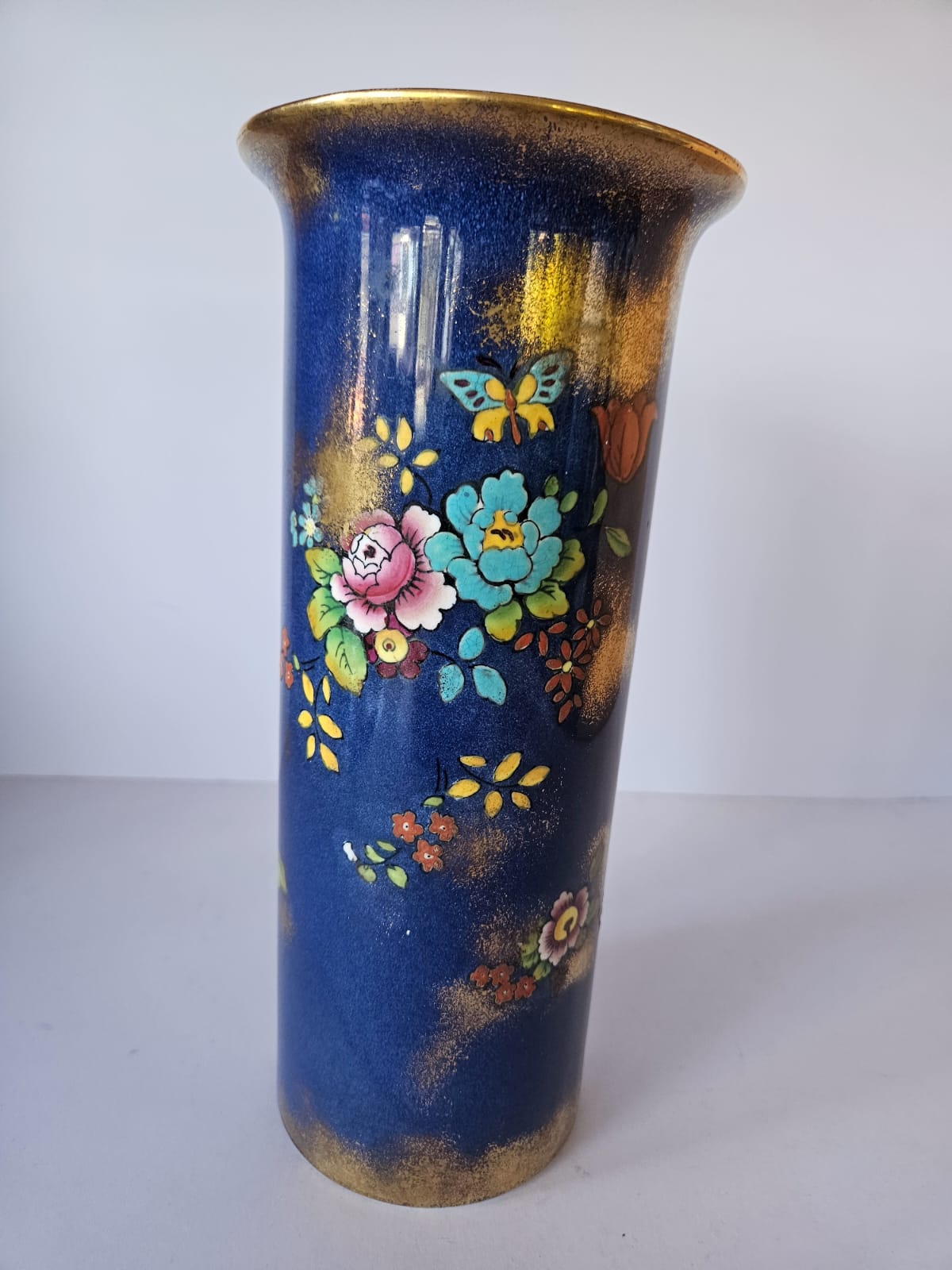 J H W & Sons Falcon Ware Cylinder Shaped Vase 1930s Cobalt Blue Floral and Butterfly 4053