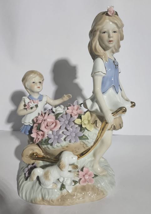 Lladro "style" Porcelaine Figure of 2 girls with Flowers in a wheelbarrow