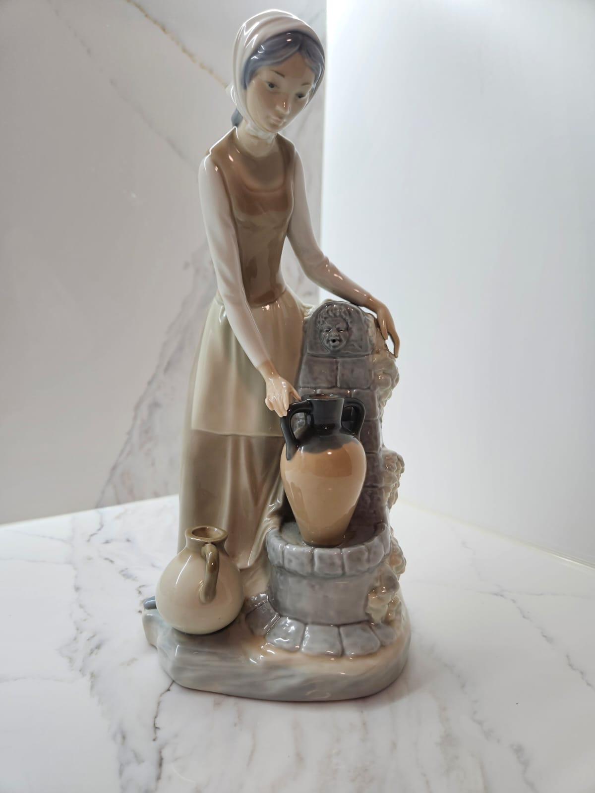 Lladro by Nao "Girl at the Fountain" figurine #0136