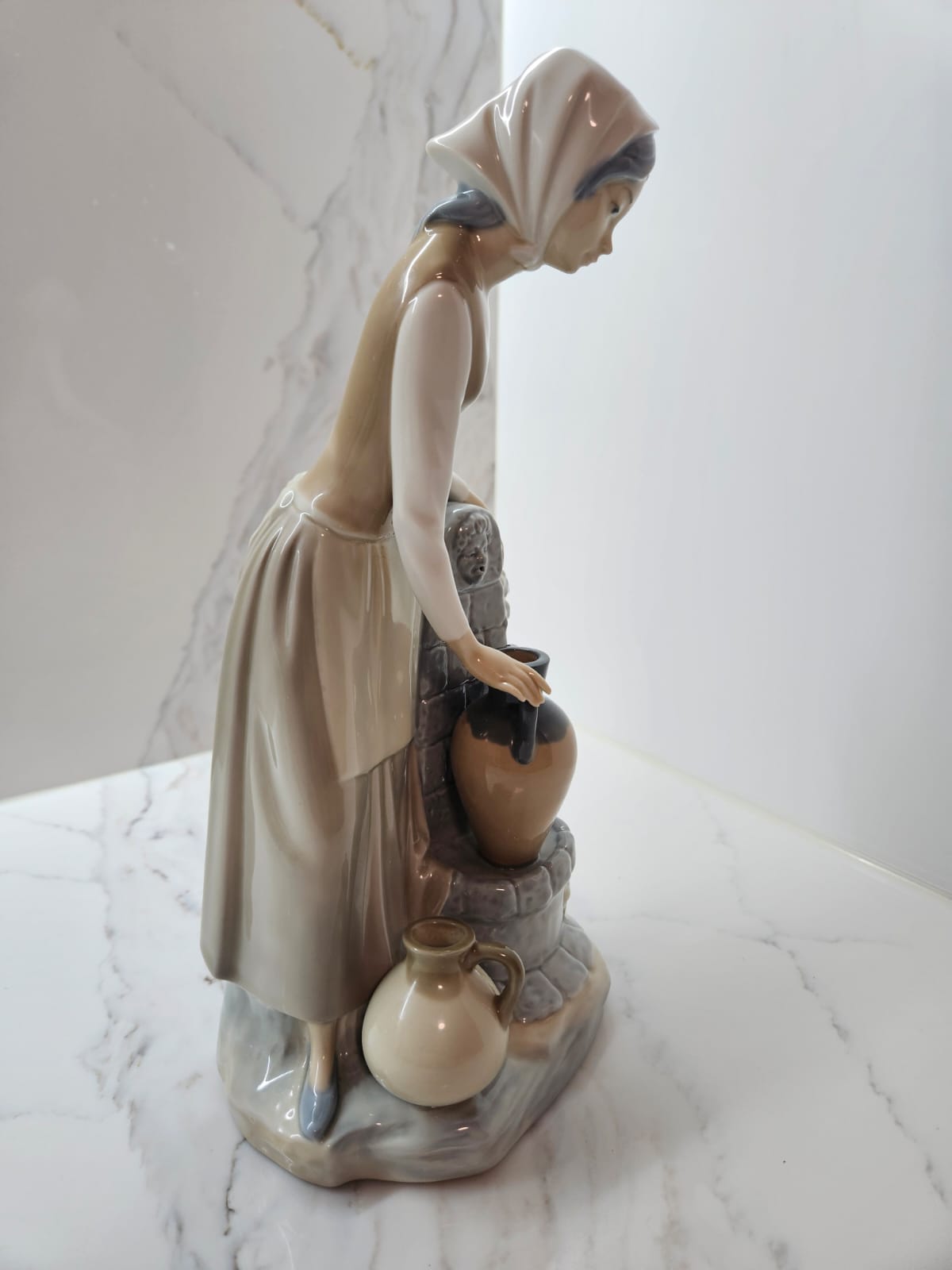 Lladro by Nao "Girl at the Fountain" figurine #0136