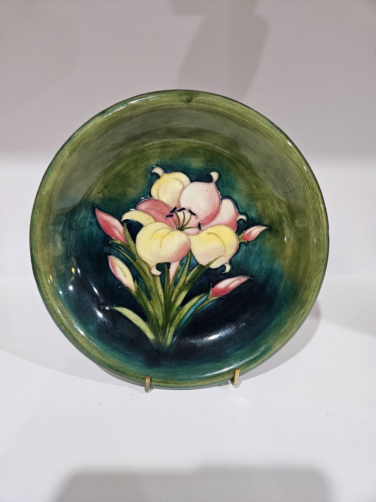 Walter Moorcroft Pottery Plate in the African Lily pattern circa 1955