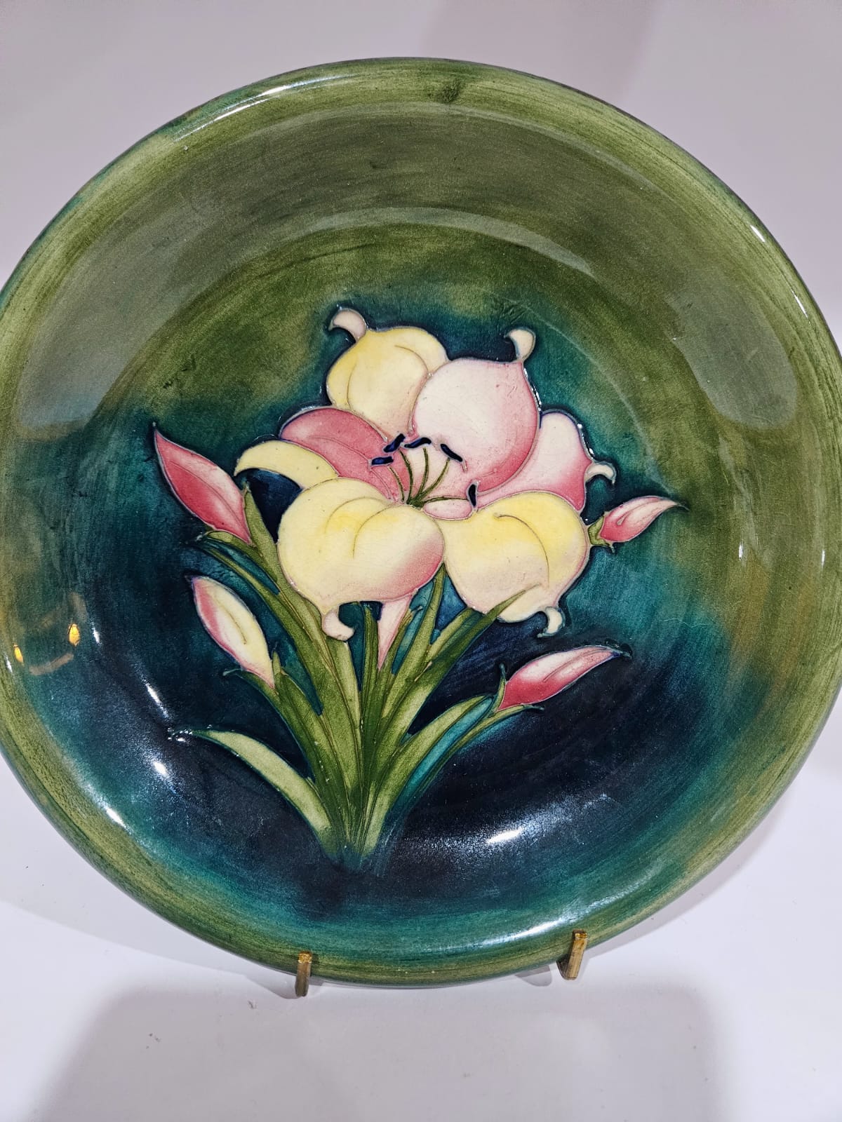 Walter Moorcroft Pottery Plate in the African Lily pattern circa 1955