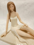 The Leonardo Collection Porcelain seated Lady
