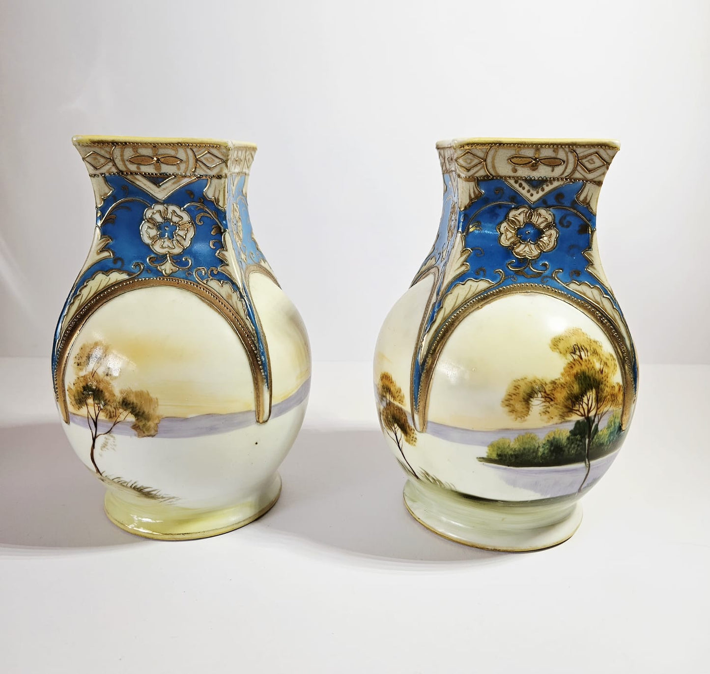 A pair of early antique NORITAKE Vases with hand painted scenes & gilding c.1890