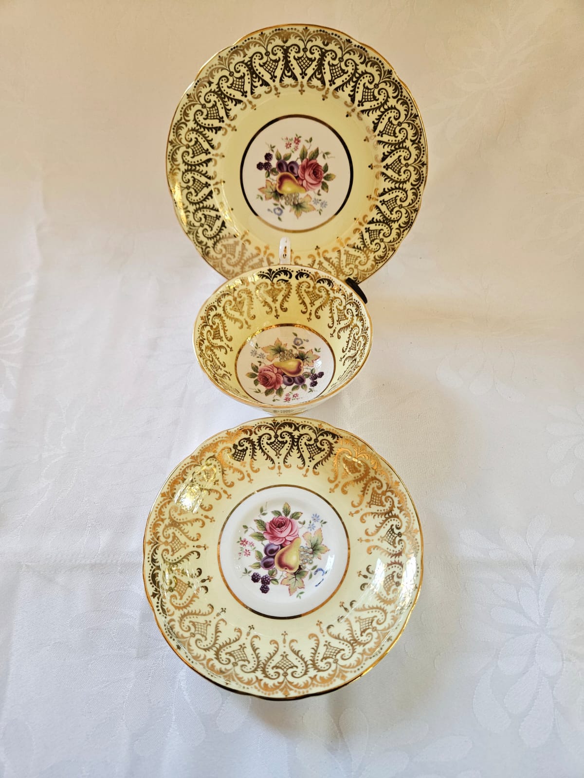 Paragon By "Appointment to Her Majesty The Queen" Pale Yellow Tea-set trio with Rose and Fruit