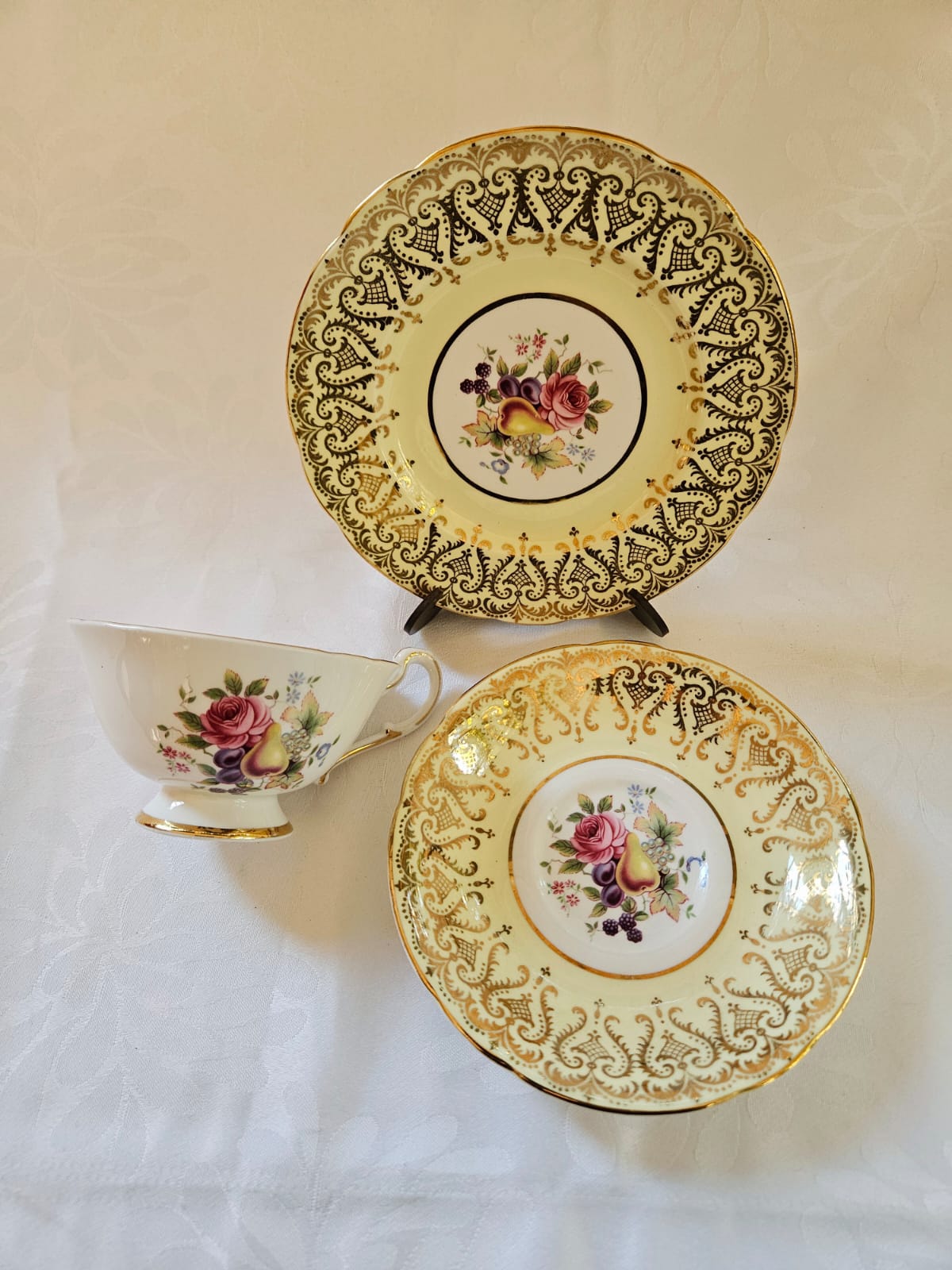 Paragon By "Appointment to Her Majesty The Queen" Pale Yellow Tea-set trio with Rose and Fruit