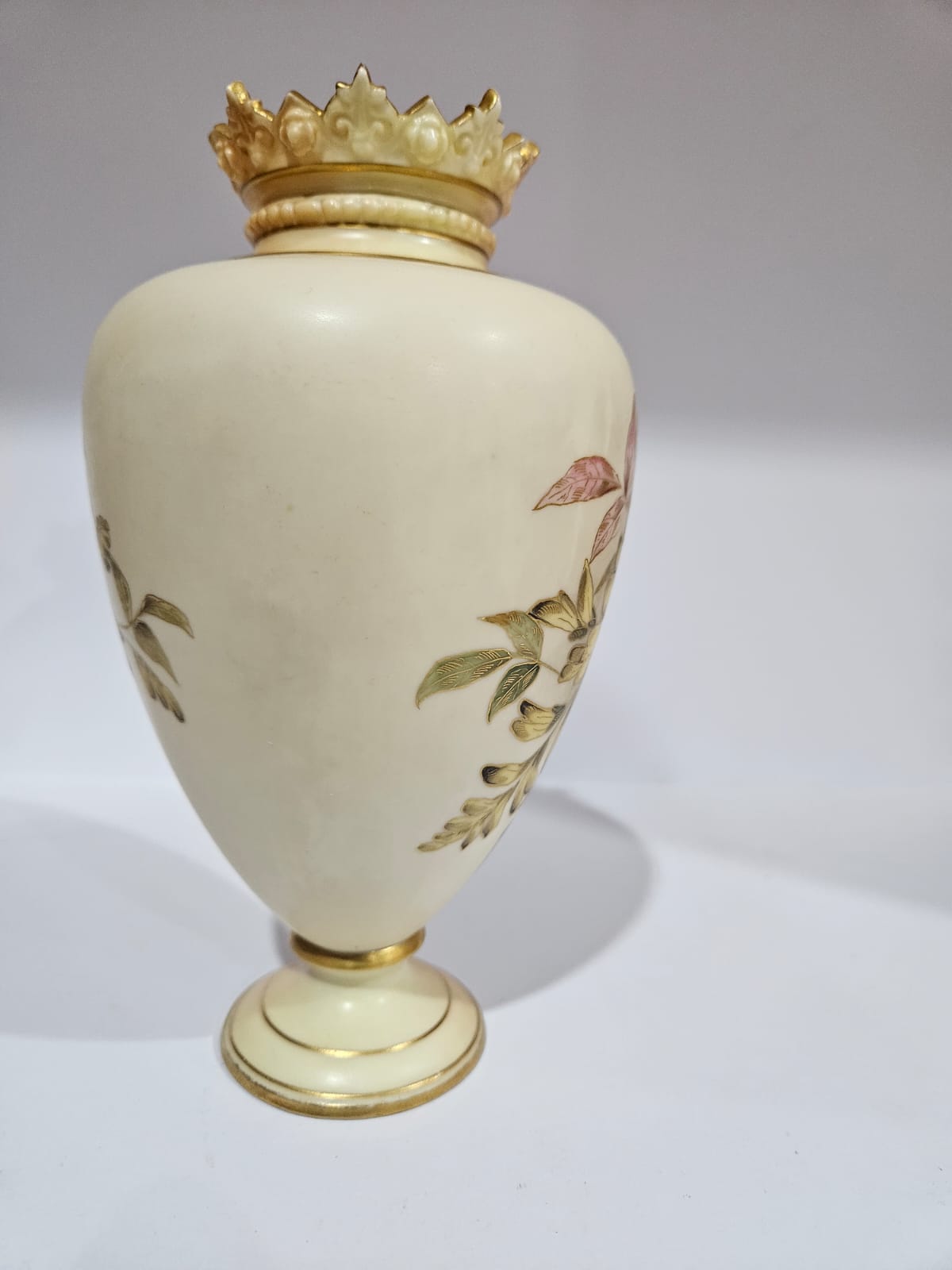 A Royal Worcester blush ivory vase with gilt and floral decoration dated 1879