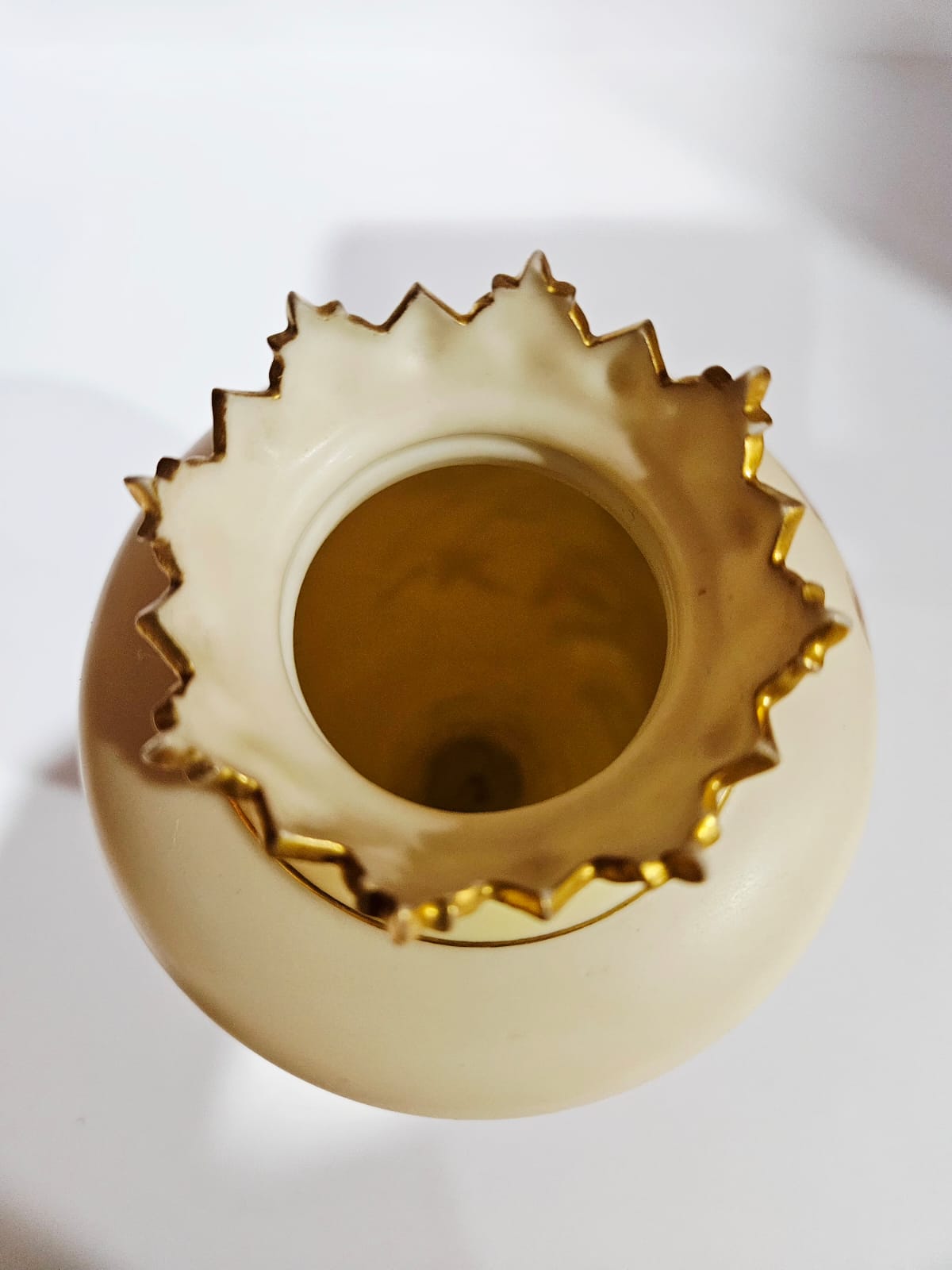 A Royal Worcester blush ivory vase with gilt and floral decoration dated 1879