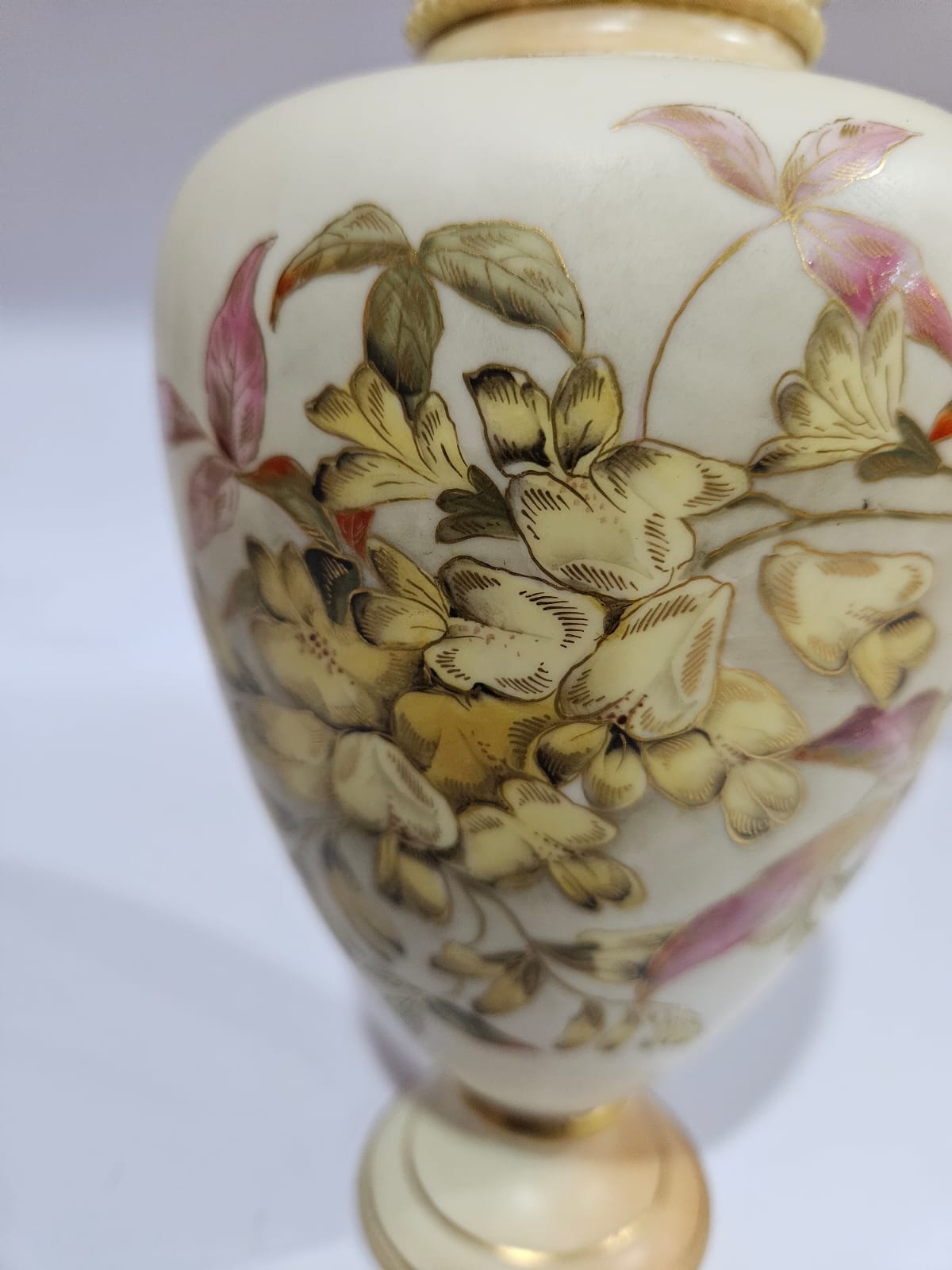 A Royal Worcester blush ivory vase with gilt and floral decoration dated 1879