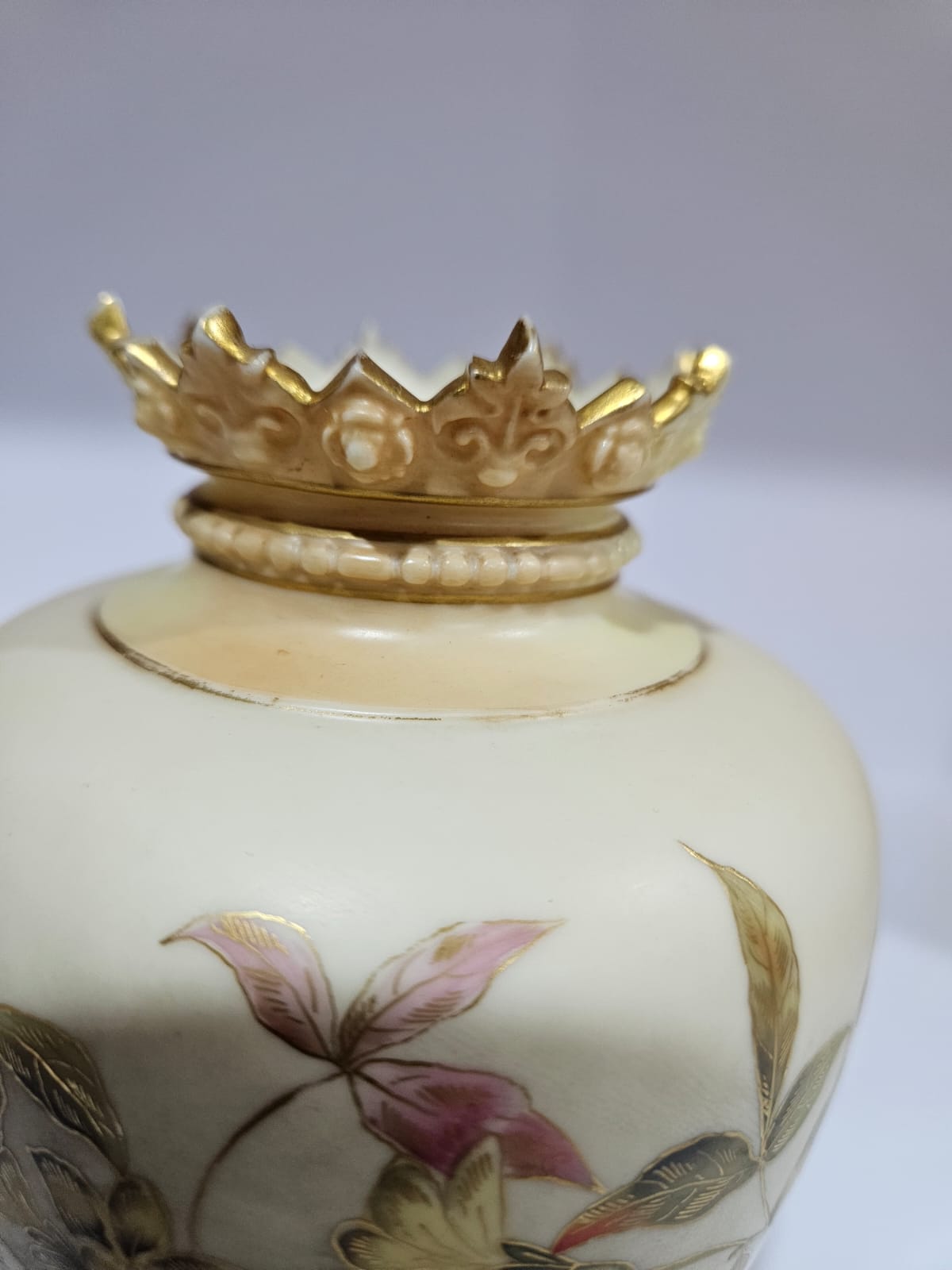 A Royal Worcester blush ivory vase with gilt and floral decoration dated 1879