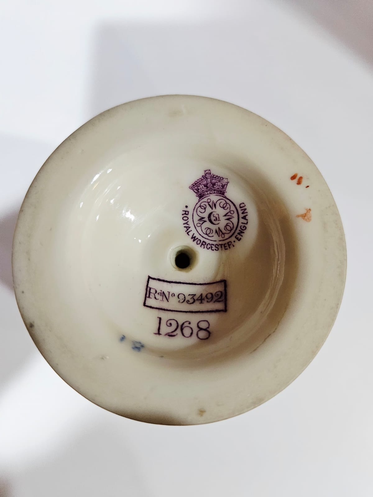 A Royal Worcester blush ivory vase with gilt and floral decoration dated 1879