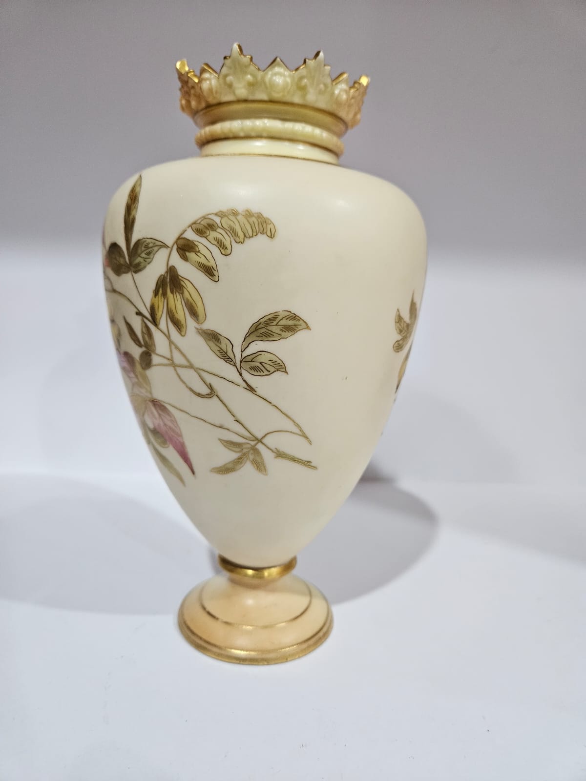 A Royal Worcester blush ivory vase with gilt and floral decoration dated 1879