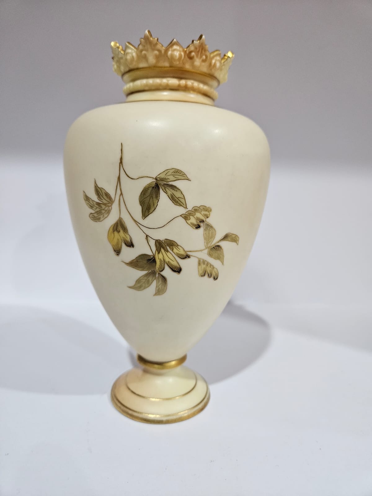 A Royal Worcester blush ivory vase with gilt and floral decoration dated 1879