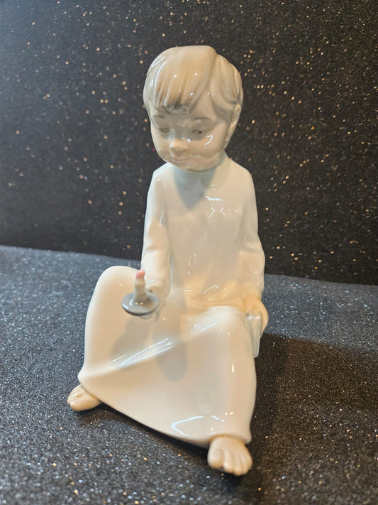 Nao by Lladro Zaphir Spain Porcelain A Boy Holding A Candle Figurine