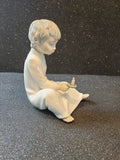 Nao by Lladro Zaphir Spain Porcelain A Boy Holding A Candle Figurine