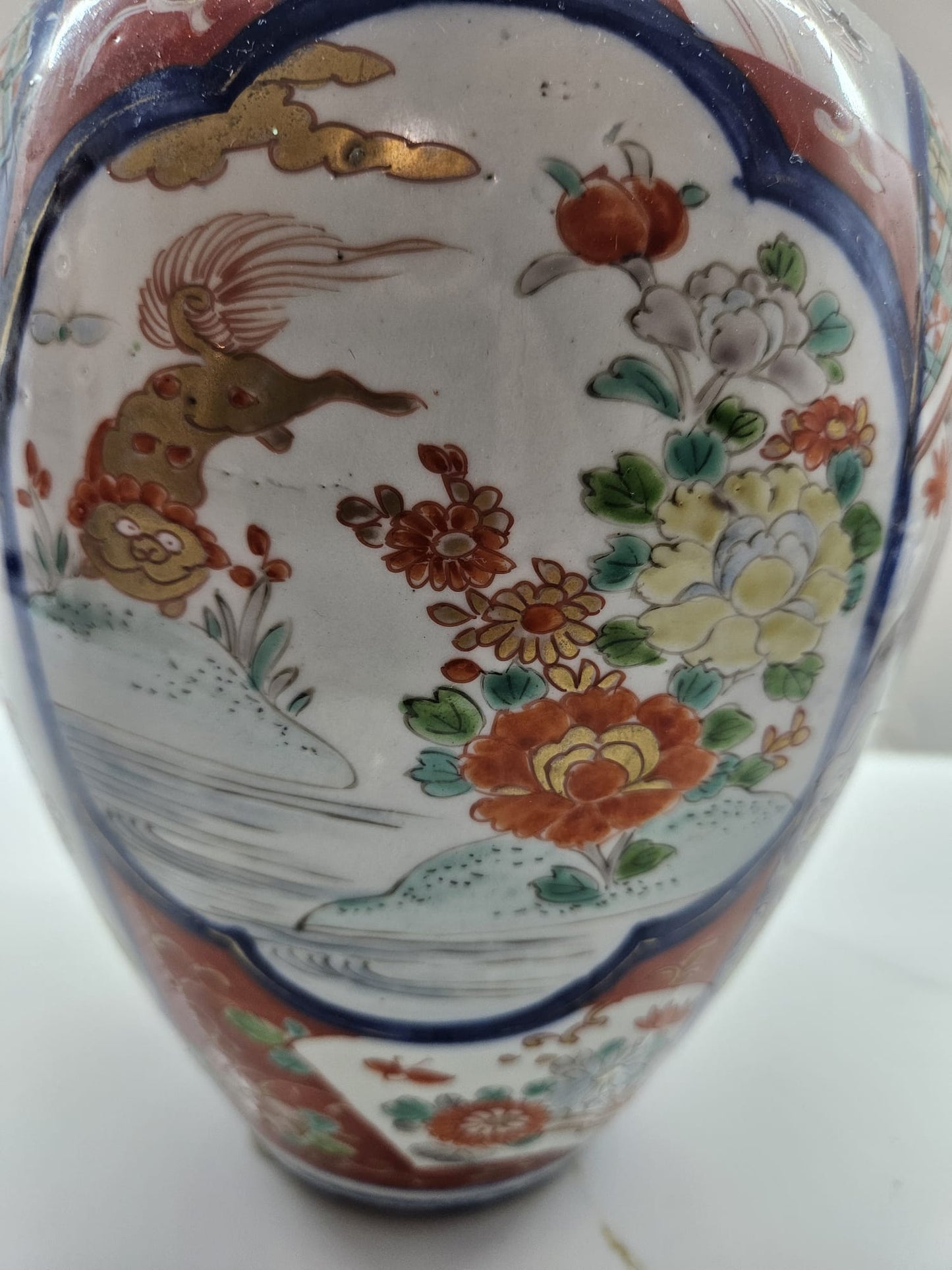 Antique Imari porcelain Vase with panels of bijins and kylins. Early 20th Century