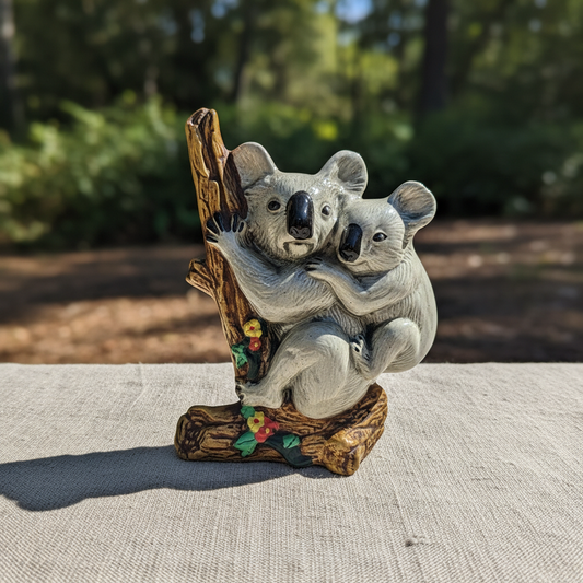 Koala et son petit sur une branche. Poterie australienne signée JH - Rare